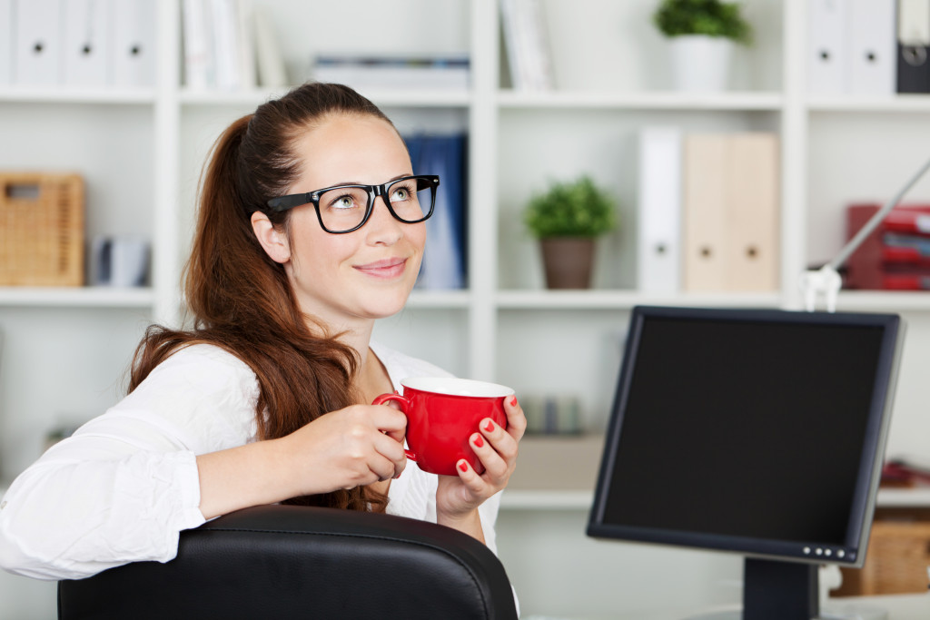 Career woman with coffee cup